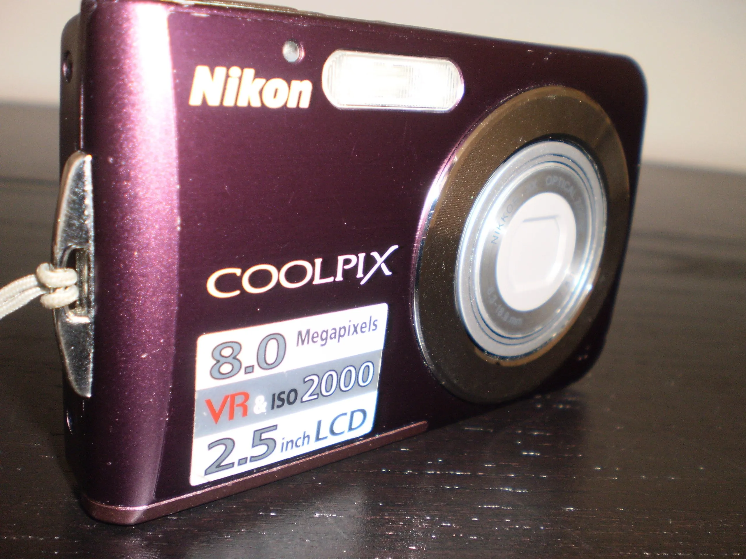 Nikon Coolpix S210 8MP Digital Camera with 3x Optical Zoom in Plum